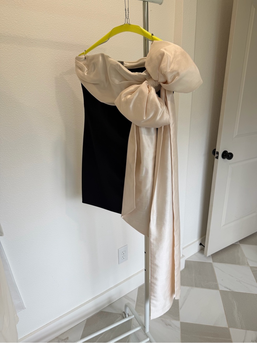 House of CB JANA. A Black Strapless Mini Dress with Champagne Bow